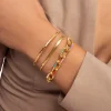 Brazalete Cane Baño Oro