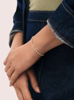 Pulsera Dots Enamel Blanco Acero Baño Oro